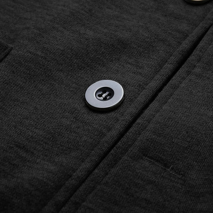 Blazer élégant homme avec poches multiples, coupe chic et moderne, couleur neutre, parfait pour toutes occasions.