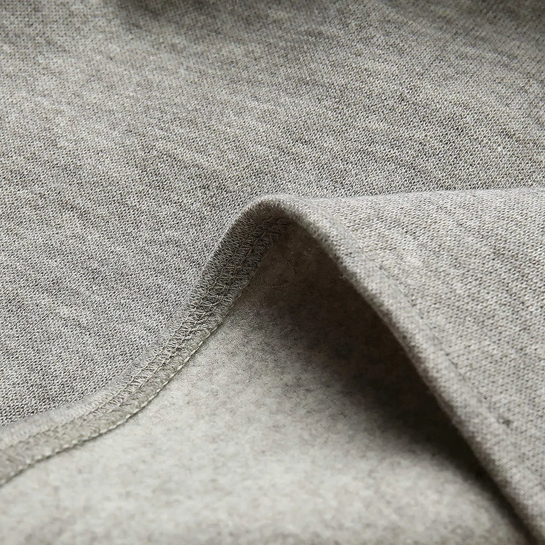 Blazer élégant homme avec poches multiples, coupe chic et moderne, couleur neutre, parfait pour toutes occasions.