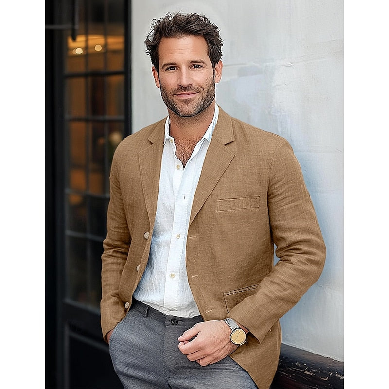 "Blazer homme chic en tissu bleu, coupe fluide, boutons noirs, pour une élégance professionnelle et décontractée."