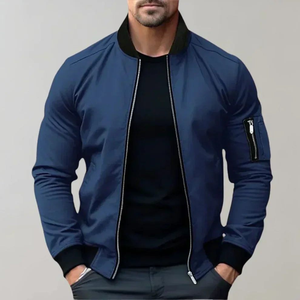 "Blouson bomber homme élégant bleu, style moderne, léger avec poches, parfait pour tenue décontractée et sorties urbaines."