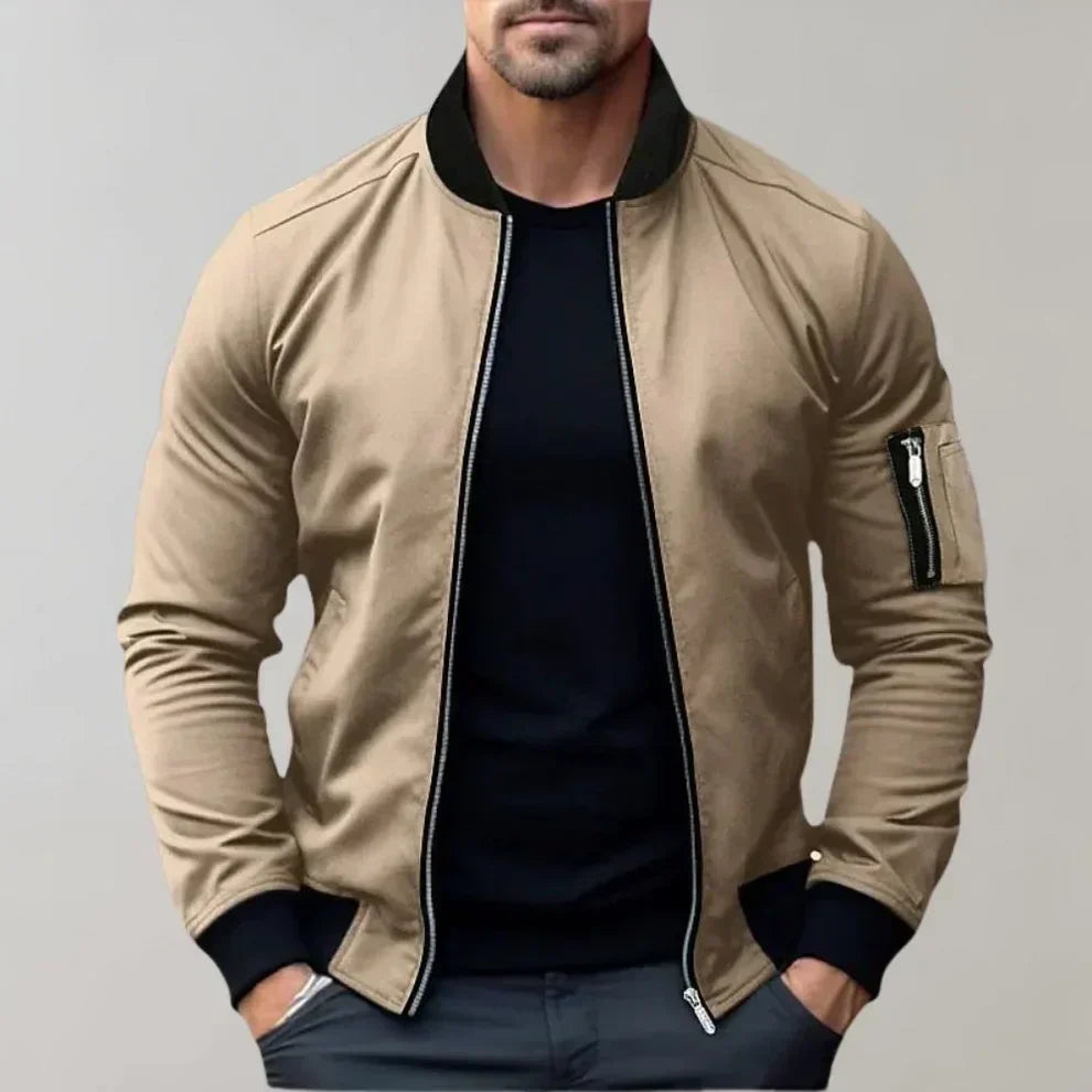 "Blouson bomber homme élégant bleu, style moderne, léger avec poches, parfait pour tenue décontractée et sorties urbaines."