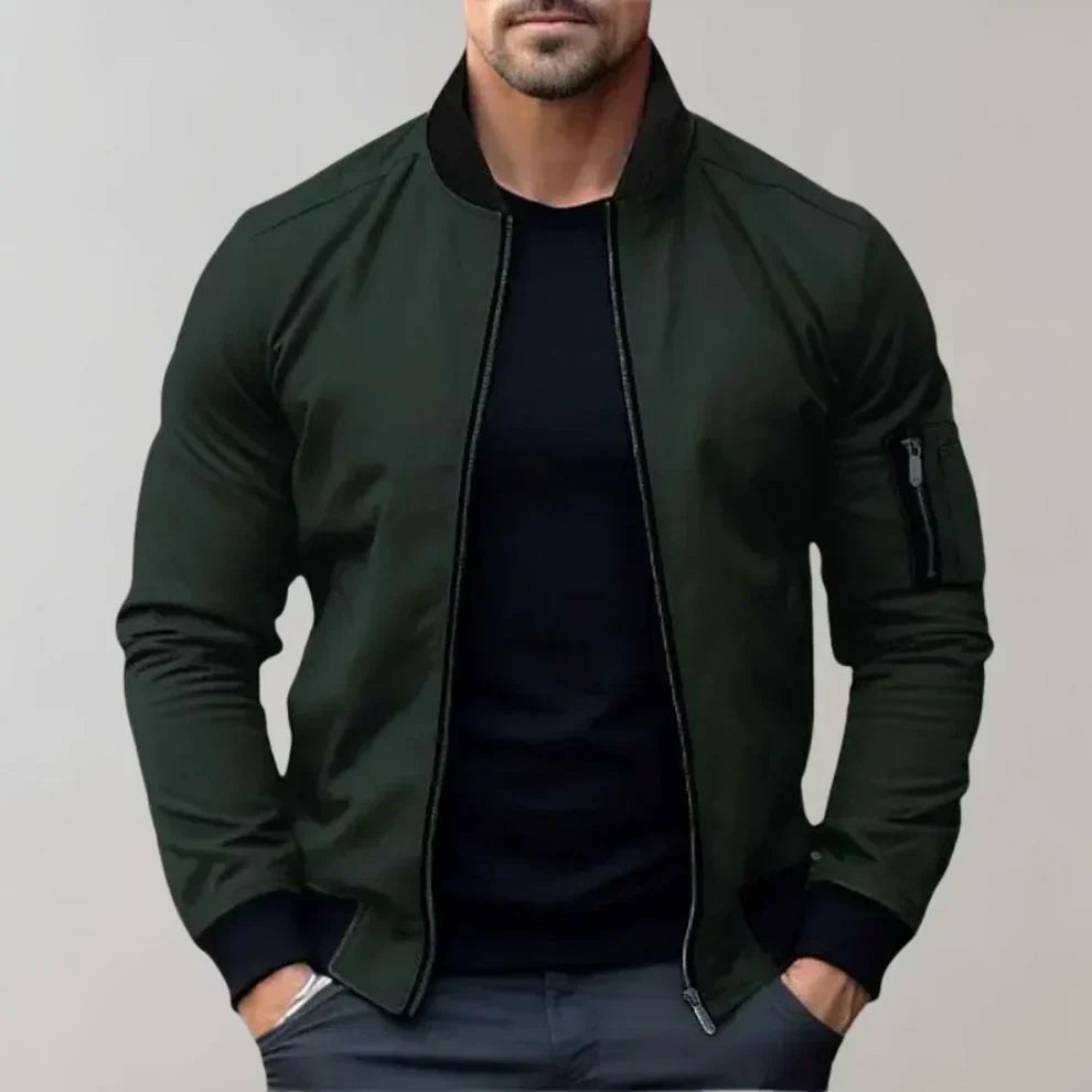 "Blouson bomber homme élégant bleu, style moderne, léger avec poches, parfait pour tenue décontractée et sorties urbaines."