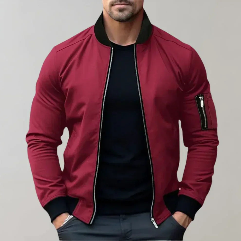 "Blouson bomber homme élégant bleu, style moderne, léger avec poches, parfait pour tenue décontractée et sorties urbaines."