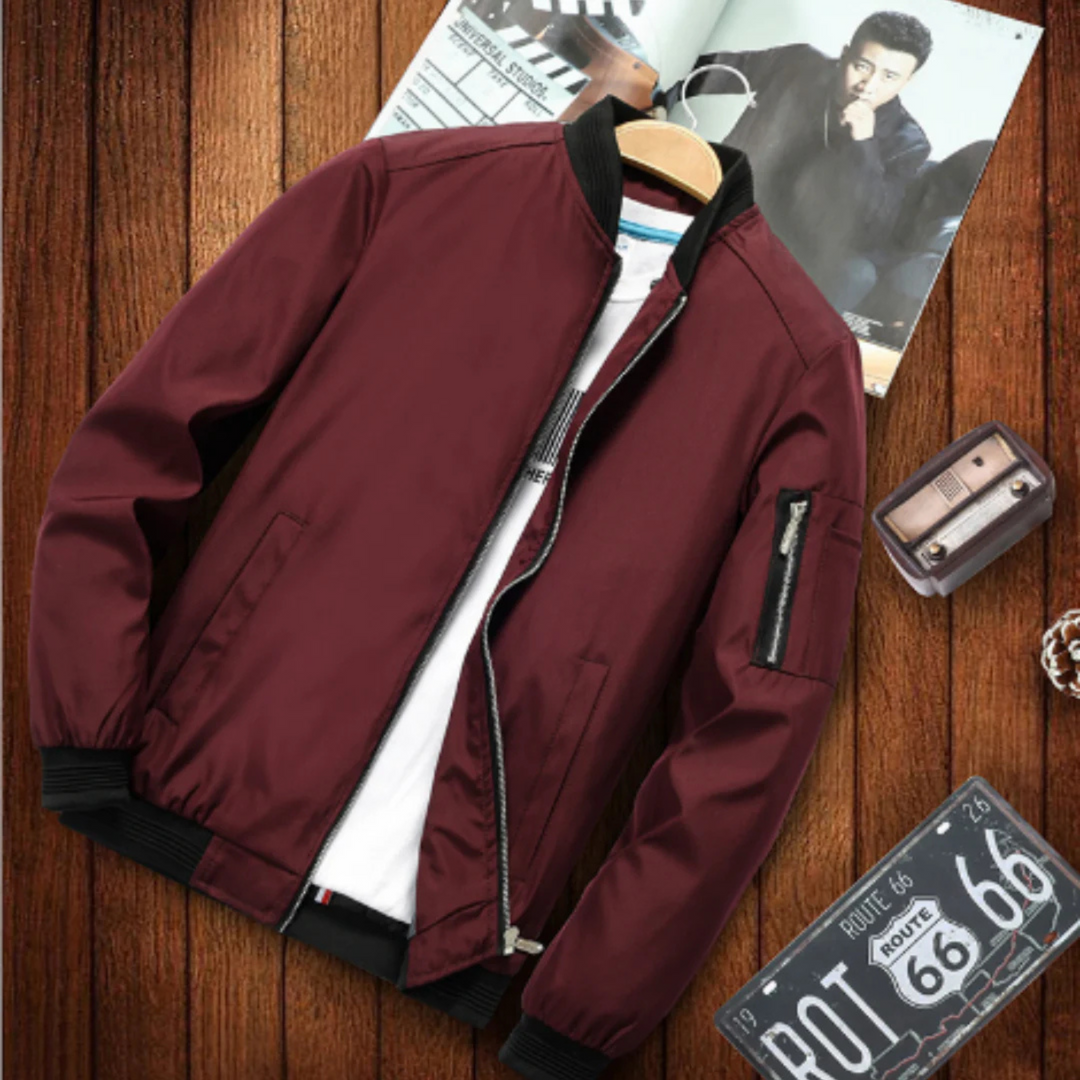 "Blouson bomber homme urbain, multi-poches, coupe-vent, en matière légère noir pour un look moderne et pratique."
