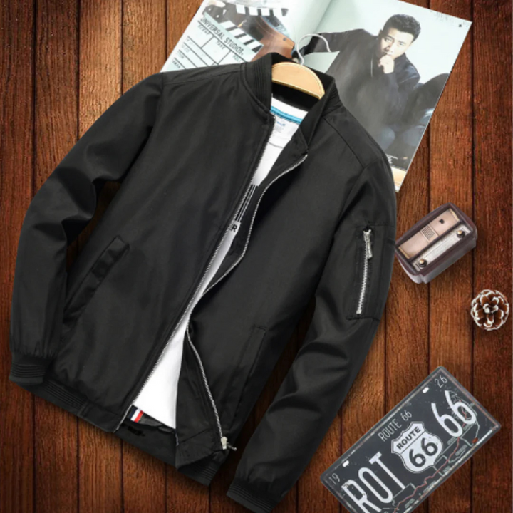 "Blouson bomber homme urbain, multi-poches, coupe-vent, en matière légère noir pour un look moderne et pratique."