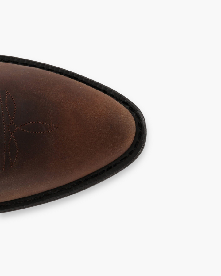 "Bottes western femme élégantes en cuir marron, détails couture soignés, style intemporel et moderne, confort premium"