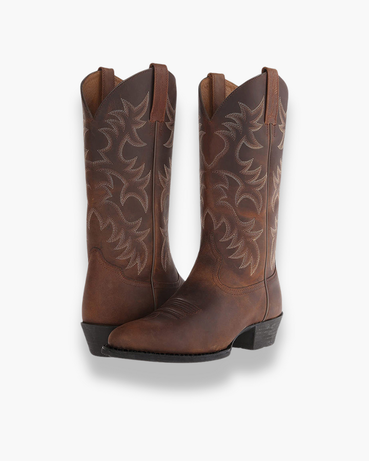 "Bottes western femme élégantes en cuir marron, détails couture soignés, style intemporel et moderne, confort premium"