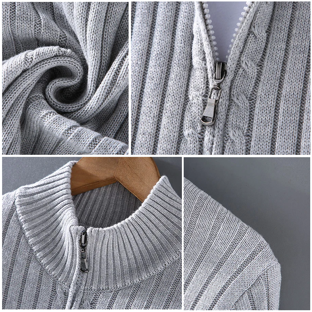 Cardigan homme en laine Shetland gris foncé avec fermeture éclair frontale, poignets côtelés et silhouette moderne élégante.