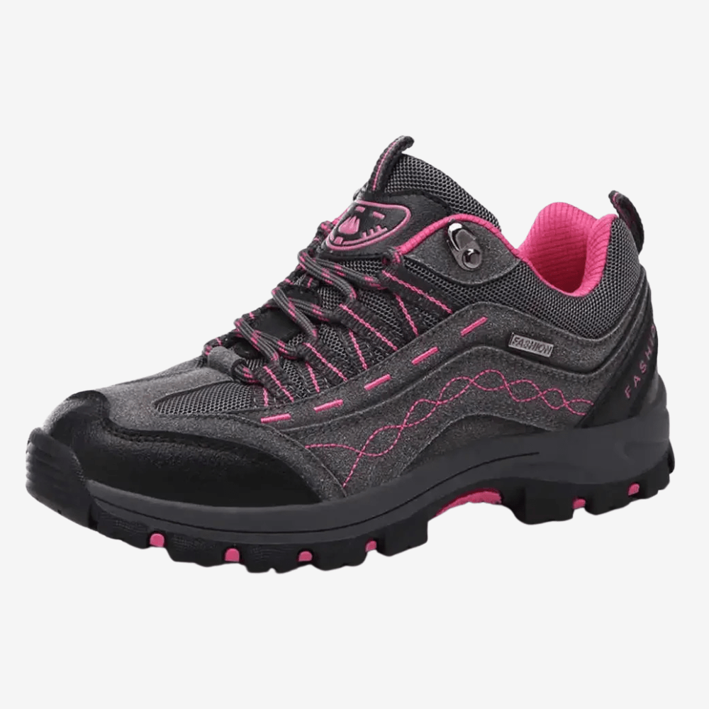 "Chaussures de randonnée imperméables femme, vue latérale, semelle antidérapante, confort et robustesse, design élégant."