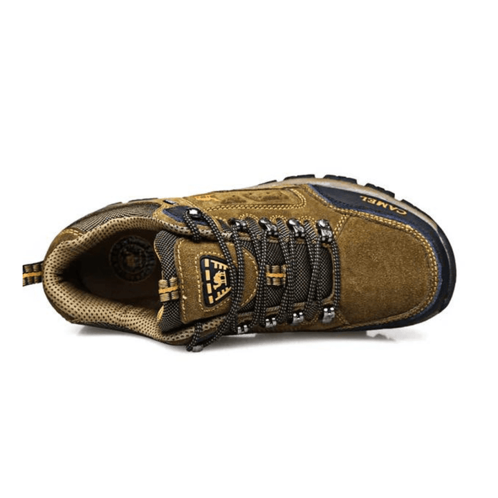 "Chaussures de randonnée imperméables pour homme, semelle antidérapante, couleur gris, idéale pour aventures extérieures."