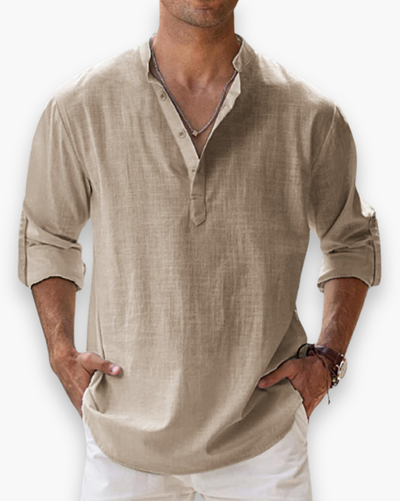 "Chemise décontractée homme, légère, respirante, en tissu ample, teinte bleue, parfait pour l'été et le confort quotidien."