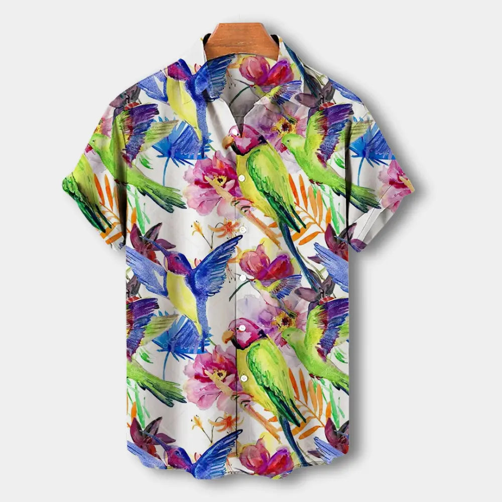 "Chemise homme à manches courtes avec motif floral vibrant, coupe décontractée et col souple pour look estival chic."