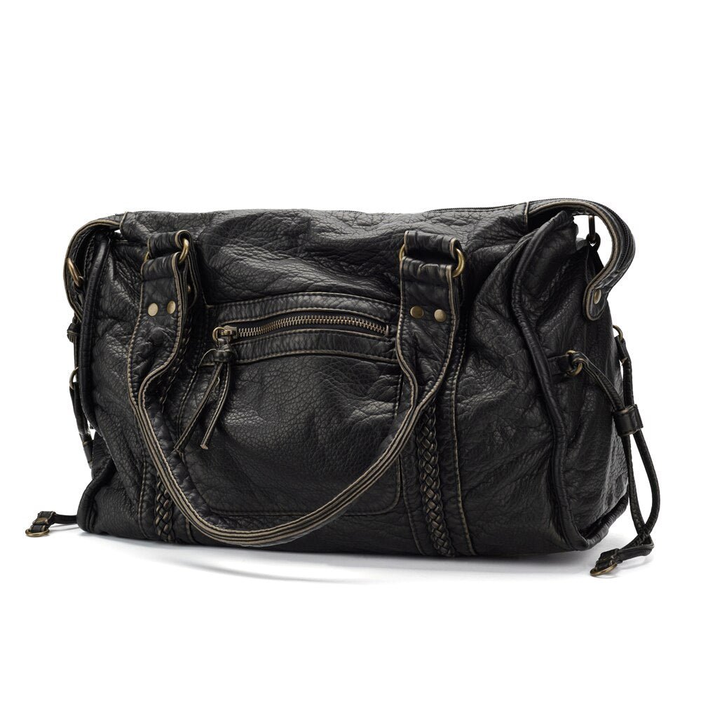 "Élégant sac à main noir en cuir véritable, chic et durable, idéal pour femmes, avec fermeture éclair et multiples compartime