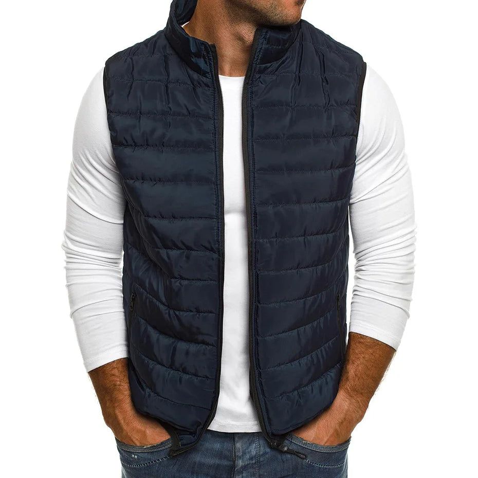 "Gilet matelassé homme élégant gris, isolation légère, idéal superpositions avec pull ou chemise, style moderne et confort."