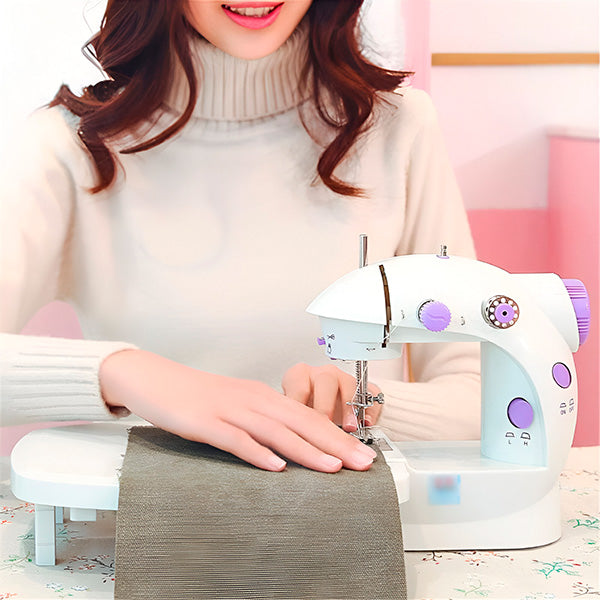 "Machine à coudre électrique compacte, légère, portable, idéale DIY, design blanc classique, fonctionnalité intuitive."