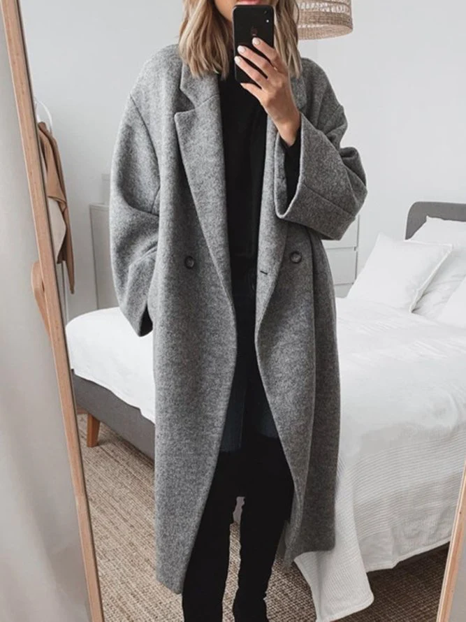 "Manteau femme oversize en laine mélangée, moderne et élégant, chaud et léger, style tendance pour l'hiver."