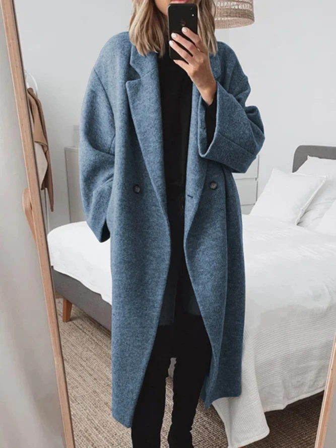 "Manteau femme oversize en laine mélangée, moderne et élégant, chaud et léger, style tendance pour l'hiver."