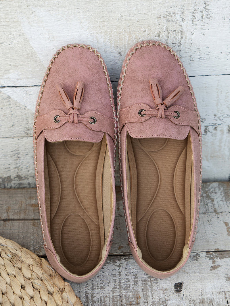 "Mocassins femme confortables en cuir bleu, élégants et pratiques, parfaits pour des marches longues et décontractées."