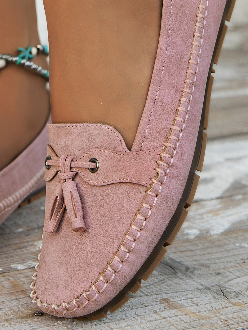"Mocassins femme confortables en cuir bleu, élégants et pratiques, parfaits pour des marches longues et décontractées."