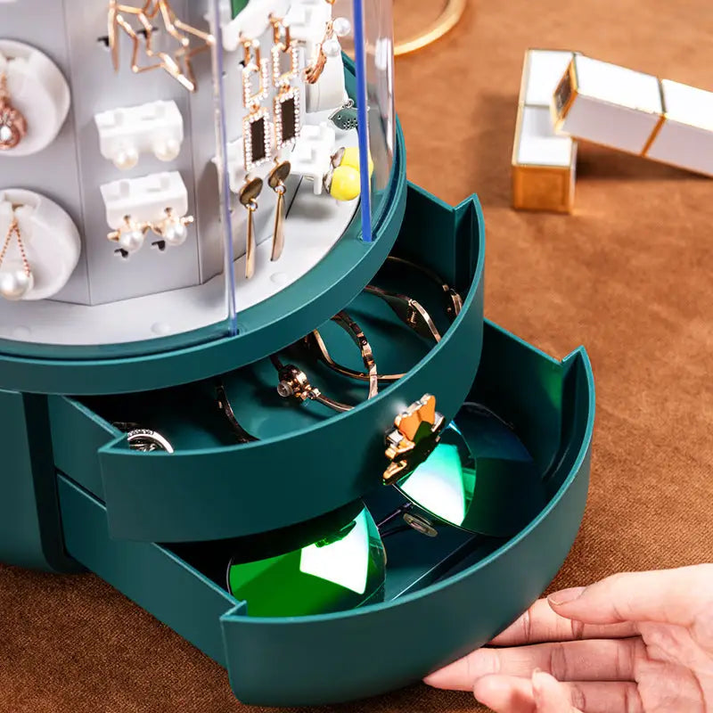 "Organisateur de bijoux rotatif en vert avec 5 tiroirs, design compact moderne, rotation à 360° pour visualisation complète."
