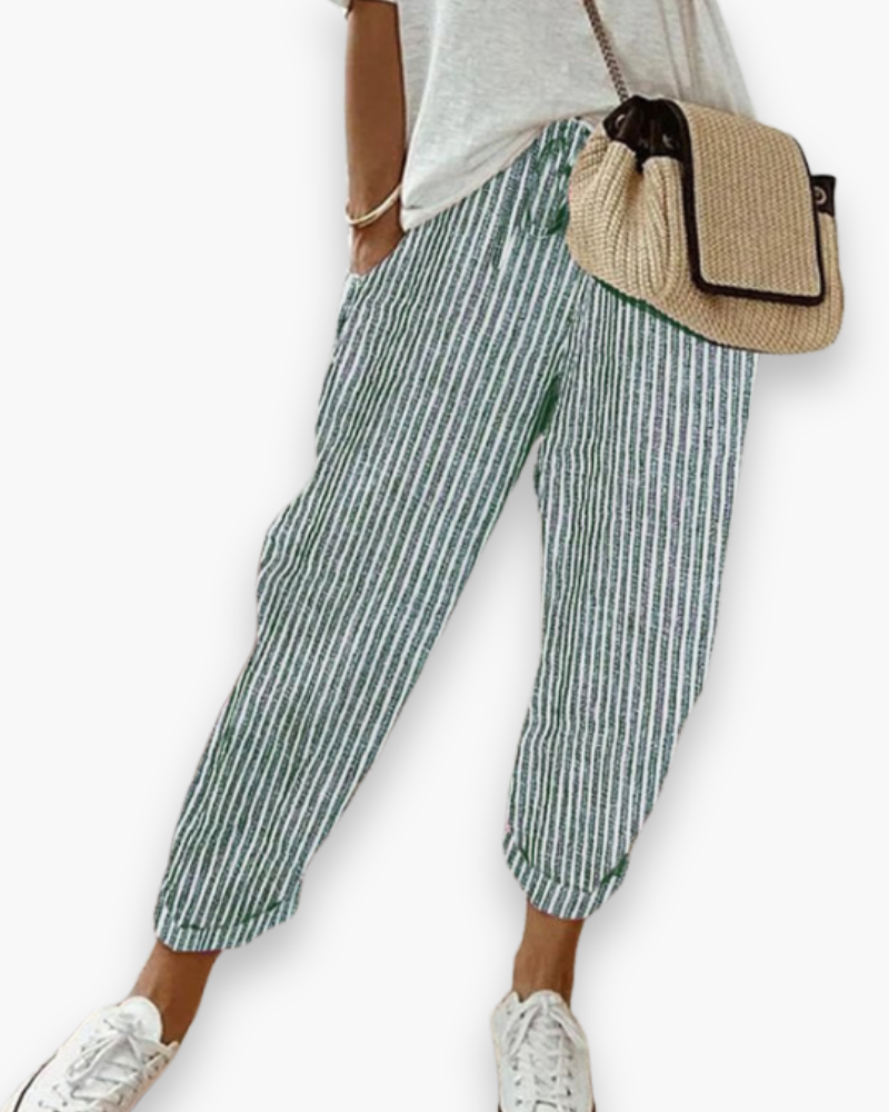 "Pantalon ample femme, tissu léger, style moderne, poches discrètes, taille élastique, coupe élégante, confort optimal"