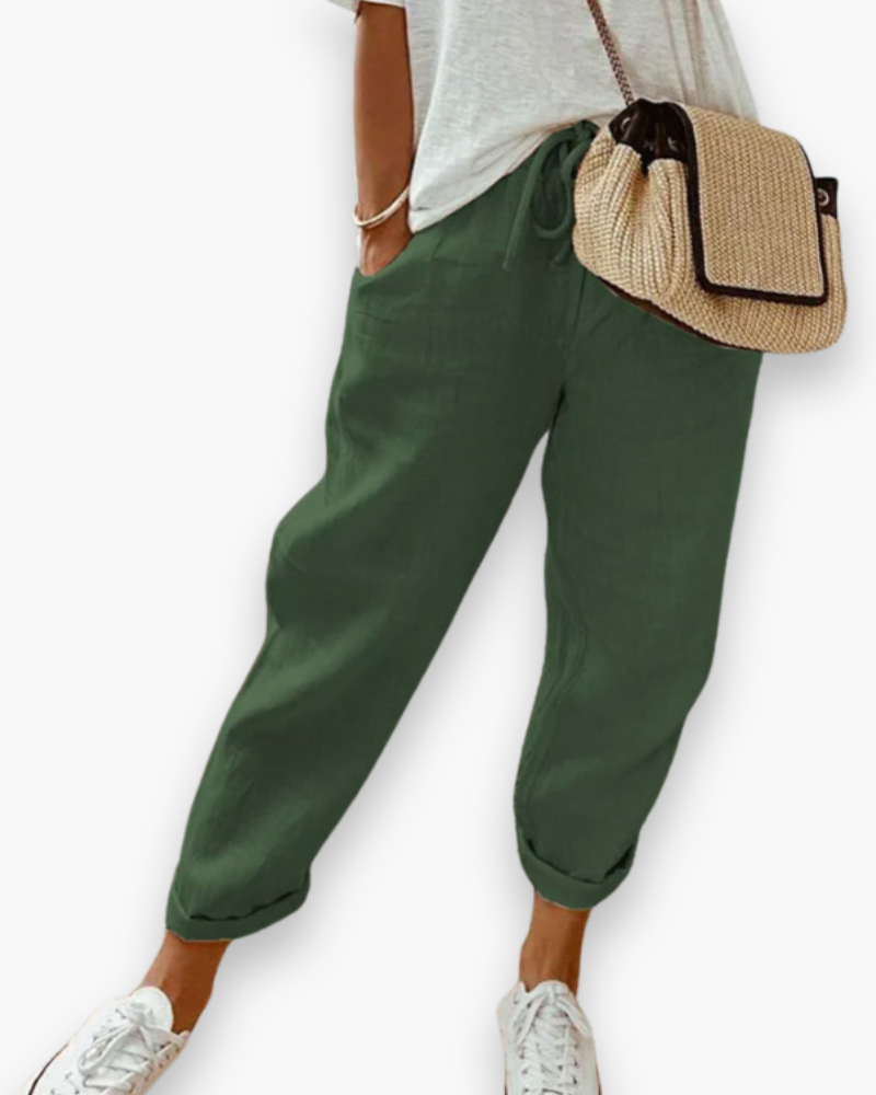 "Pantalon ample femme, tissu léger, style moderne, poches discrètes, taille élastique, coupe élégante, confort optimal"