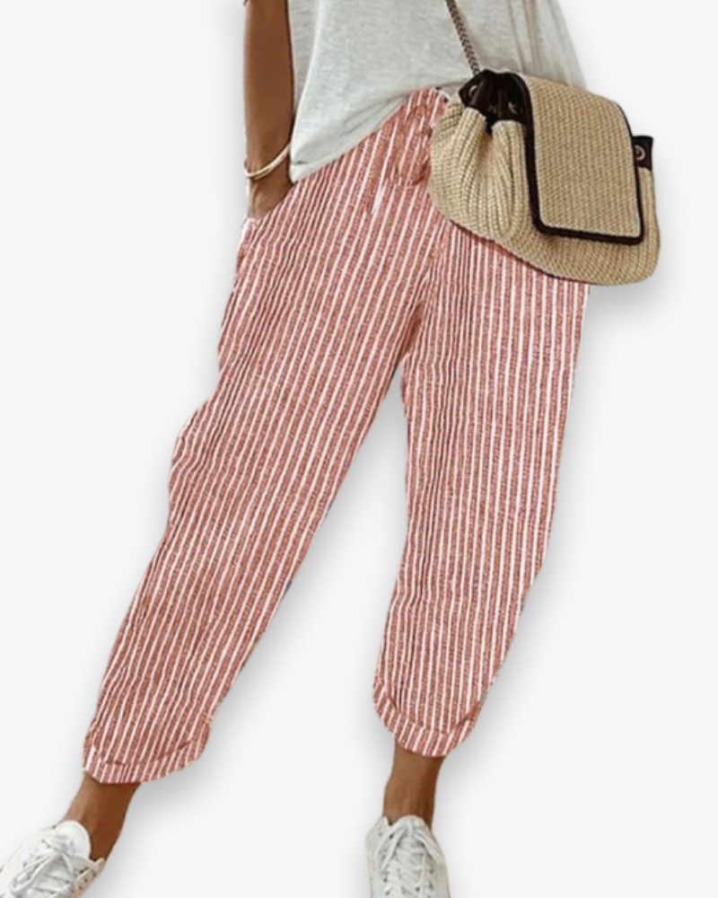 "Pantalon ample femme, tissu léger, style moderne, poches discrètes, taille élastique, coupe élégante, confort optimal"