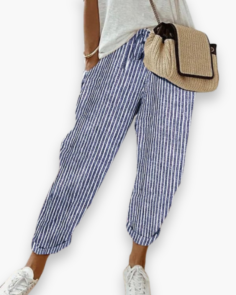 "Pantalon ample femme, tissu léger, style moderne, poches discrètes, taille élastique, coupe élégante, confort optimal"