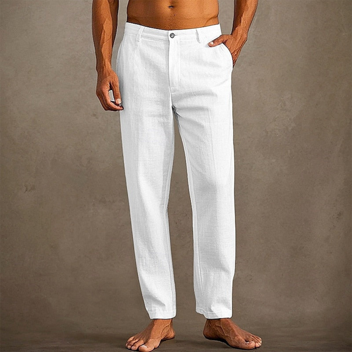 Pantalon d'été beige décontracté pour homme, coupe classique, léger et confortable, idéale pour un look estival minimaliste.