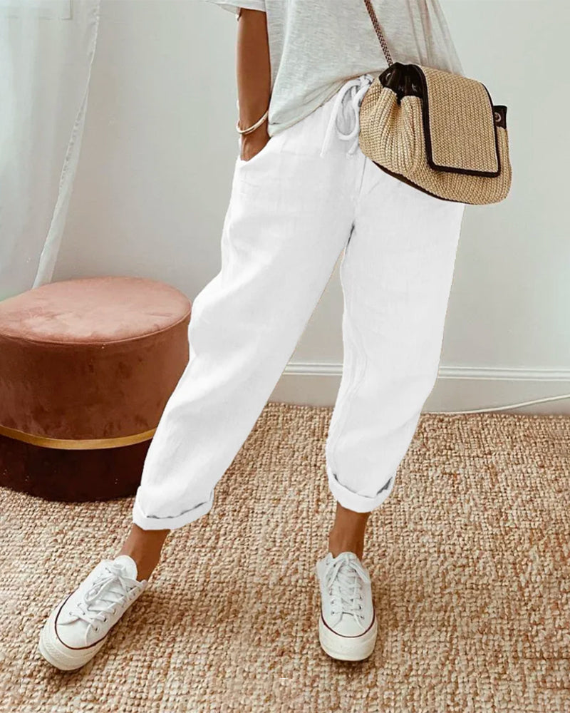 "Pantalon en lin décontracté femme, coupe ample, taille haute élastique, léger et anti-transpiration pour l'été."