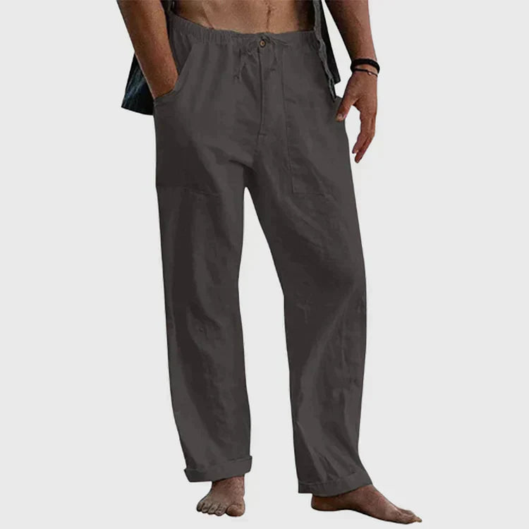 "Pantalon en lin pour hommes avec cordon ajustable, style décontracté, couleur claire, tissu respirant."