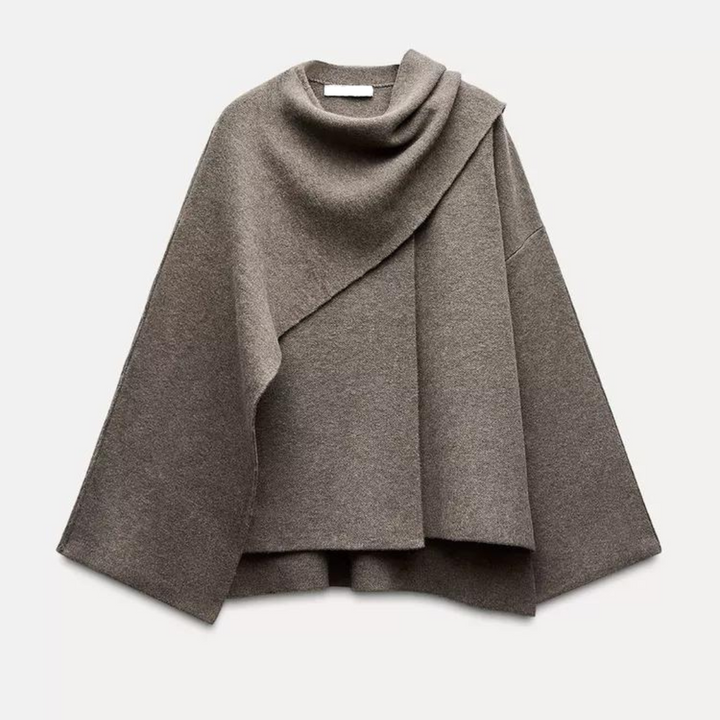 "Poncho femme en laine gris foncé avec design asymétrique, élégant et chaud, idéal pour l'hiver, vue complète."