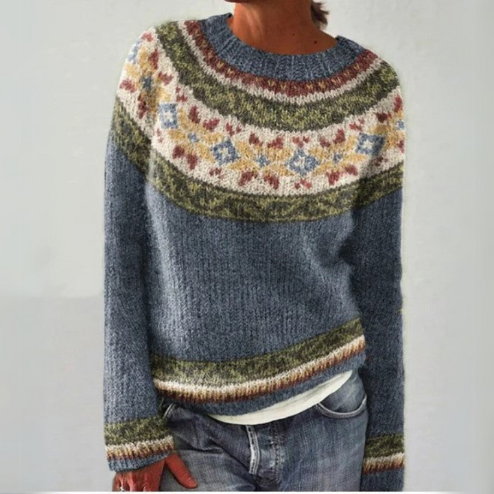 "Pull femme coloré en maille douce, manches longues, coupe confortable, motif multicolore, idéal pour l'automne-hiver."