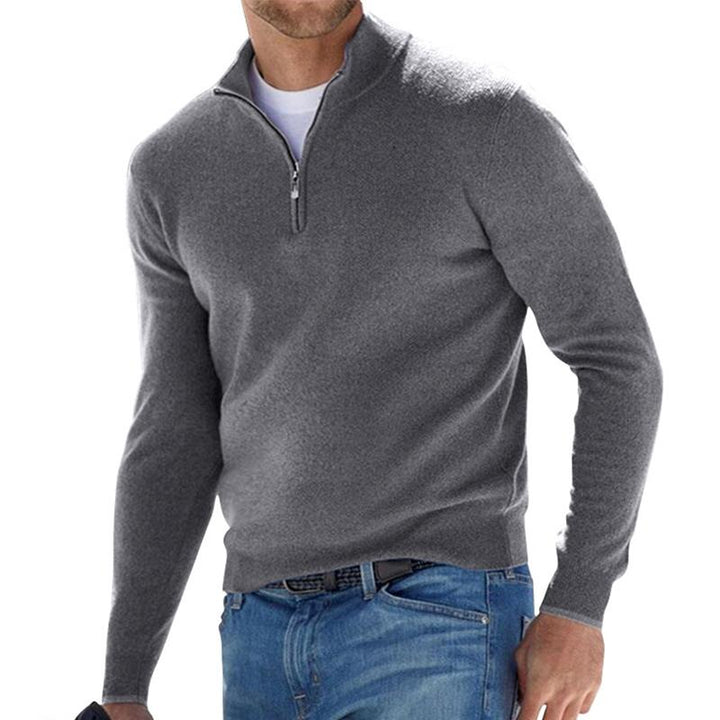 "Pull homme en laine chaude, texture douce, coupe ajustée, polyvalent, élégant, disponible en plusieurs couleurs."