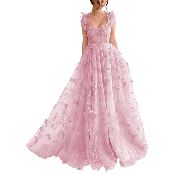 "Robe longue en tulle à volants, style raffiné et féminin, idéale pour mariages et occasions spéciales, couleur pastel."