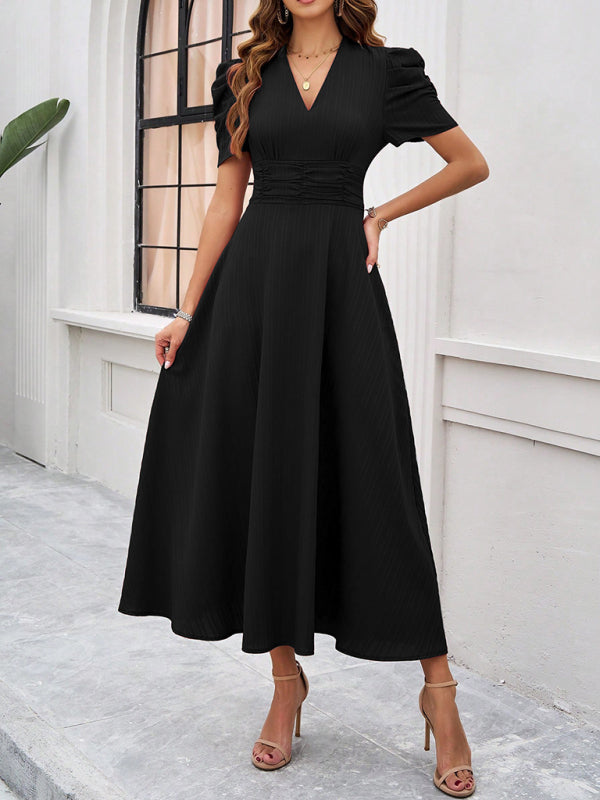 Robe midi évasée élégante avec taille cintrée, manches bouffantes, col V, idéale pour occasions spéciales.