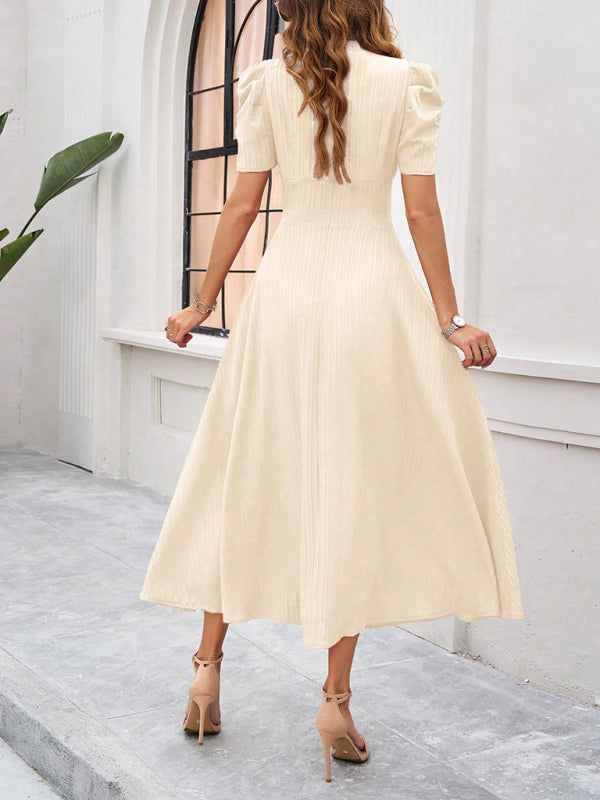 Robe midi évasée élégante avec taille cintrée, manches bouffantes, col V, idéale pour occasions spéciales.