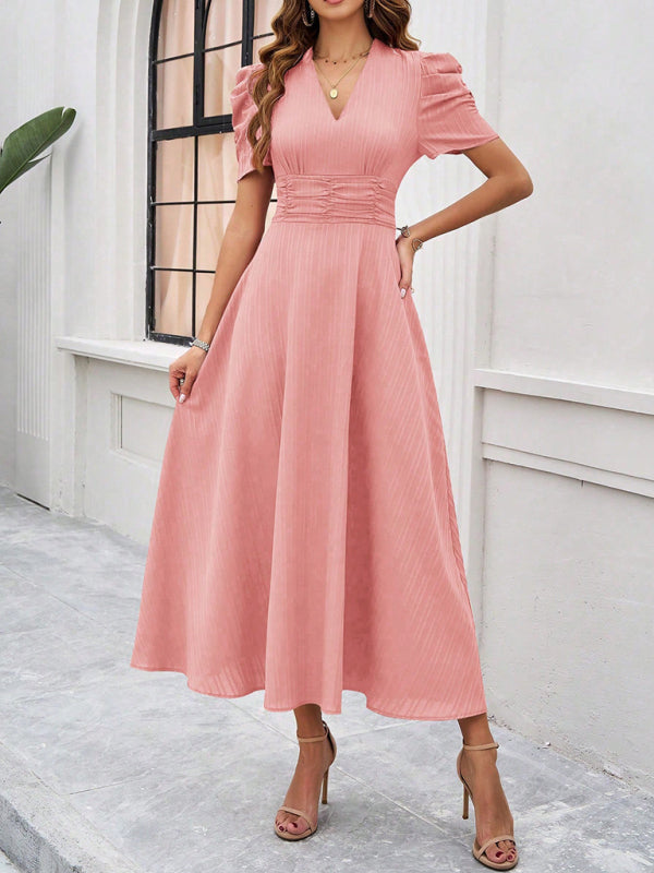 Robe midi évasée élégante avec taille cintrée, manches bouffantes, col V, idéale pour occasions spéciales.