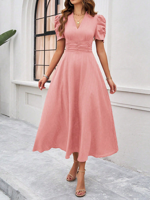 Robe midi évasée élégante avec taille cintrée, manches bouffantes, col V, idéale pour occasions spéciales.