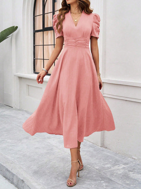 Robe midi évasée élégante avec taille cintrée, manches bouffantes, col V, idéale pour occasions spéciales.
