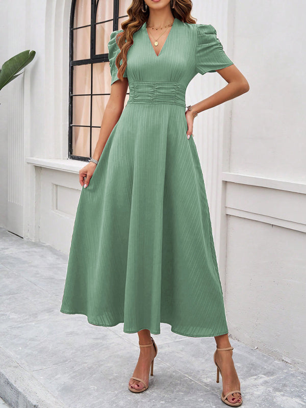 Robe midi évasée élégante avec taille cintrée, manches bouffantes, col V, idéale pour occasions spéciales.