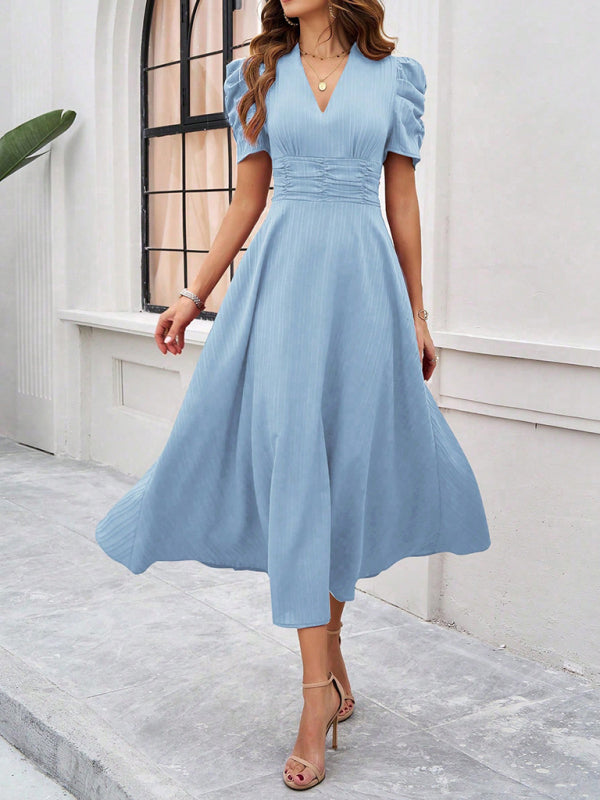 Robe midi évasée élégante avec taille cintrée, manches bouffantes, col V, idéale pour occasions spéciales.