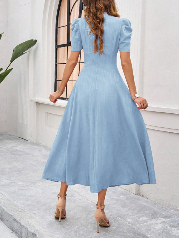 Robe midi évasée élégante avec taille cintrée, manches bouffantes, col V, idéale pour occasions spéciales.