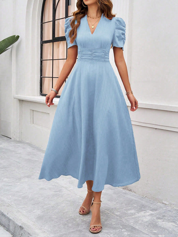 Robe midi évasée élégante avec taille cintrée, manches bouffantes, col V, idéale pour occasions spéciales.