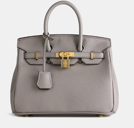 "Sac à main en cuir beige avec cadenas, style élégant, accessoire femme pour toutes occasions, luxe et fonctionnalité."