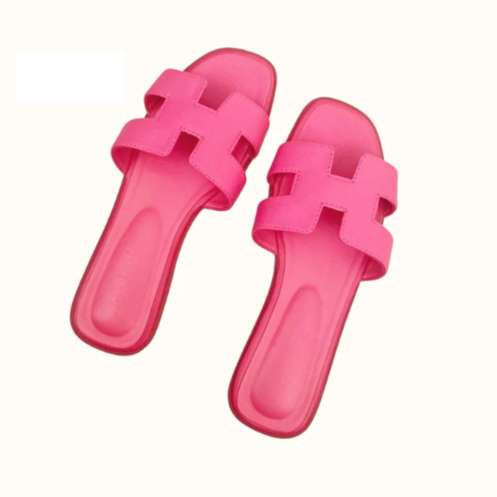 Sandales H-Stylé pour femmes en cuir, design moderne en H, talon plat, couleur beige, élégance et confort pour l'été.