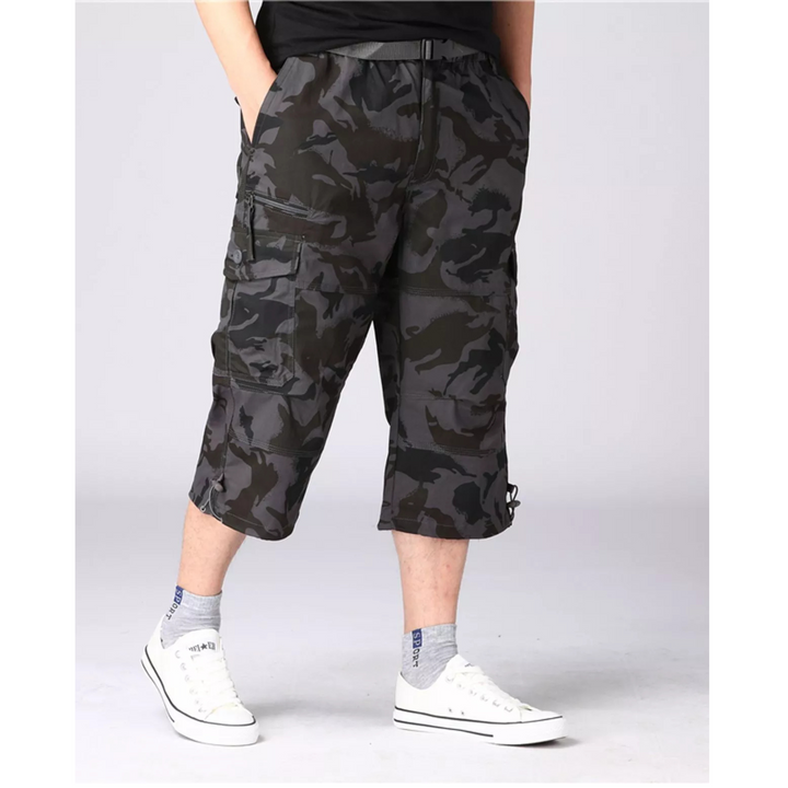 "Short cargo homme léger avec nombreuses poches, coupe longue, coton doux. Idéal pour l'été et les activités en plein air."