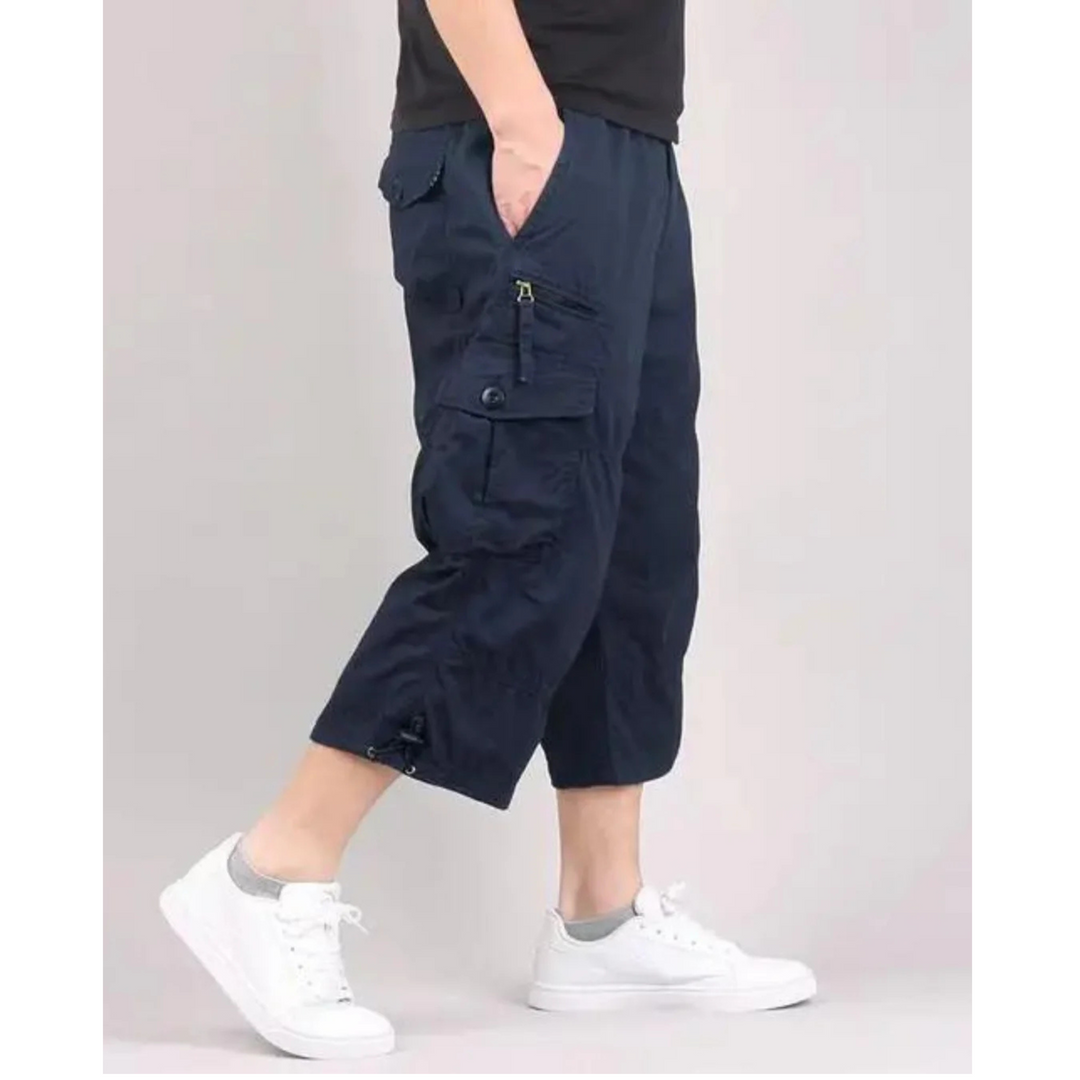 "Short cargo homme léger avec nombreuses poches, coupe longue, coton doux. Idéal pour l'été et les activités en plein air."