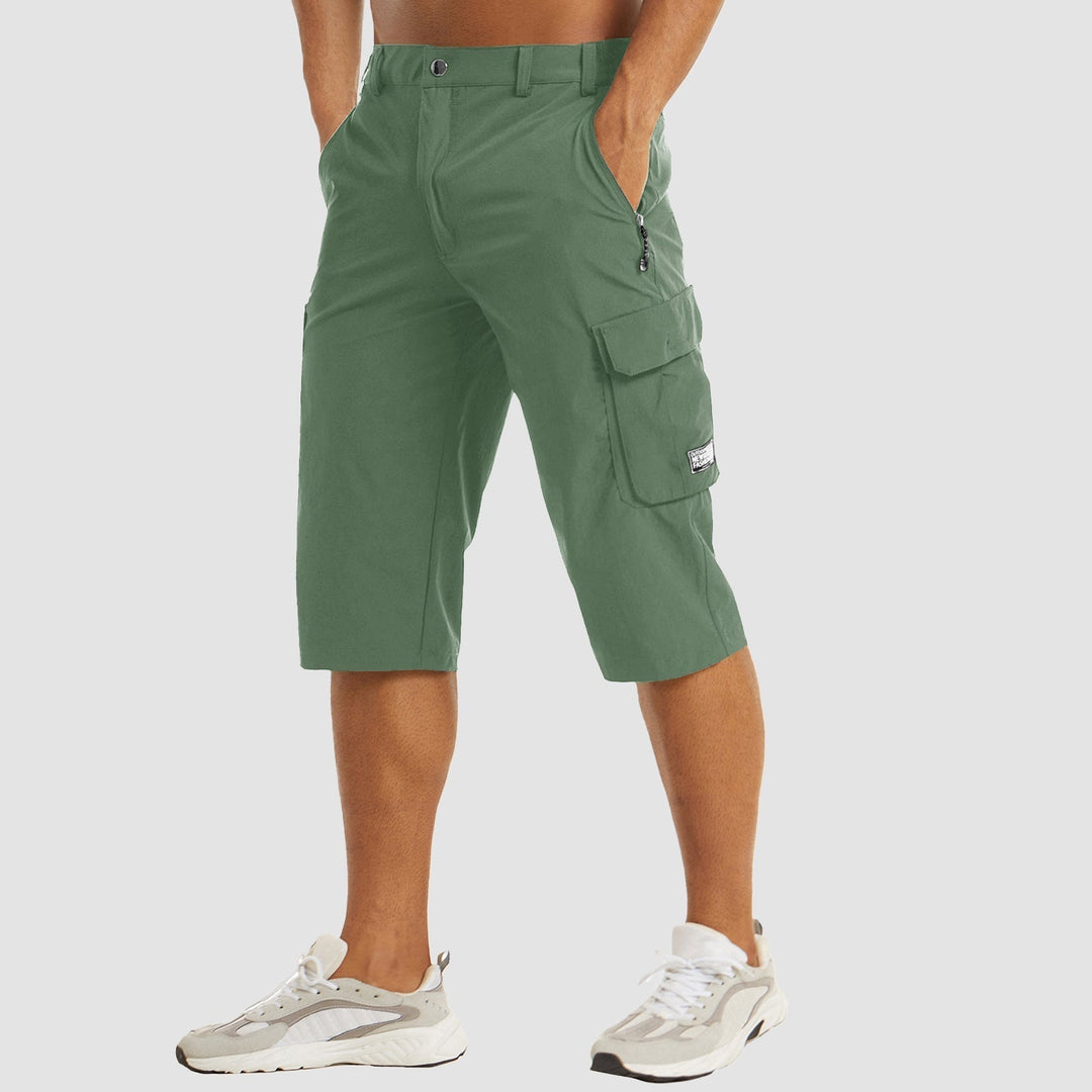 "Short cargo homme séchage rapide, multiples poches, design moderne et pratique, idéal aventure été."