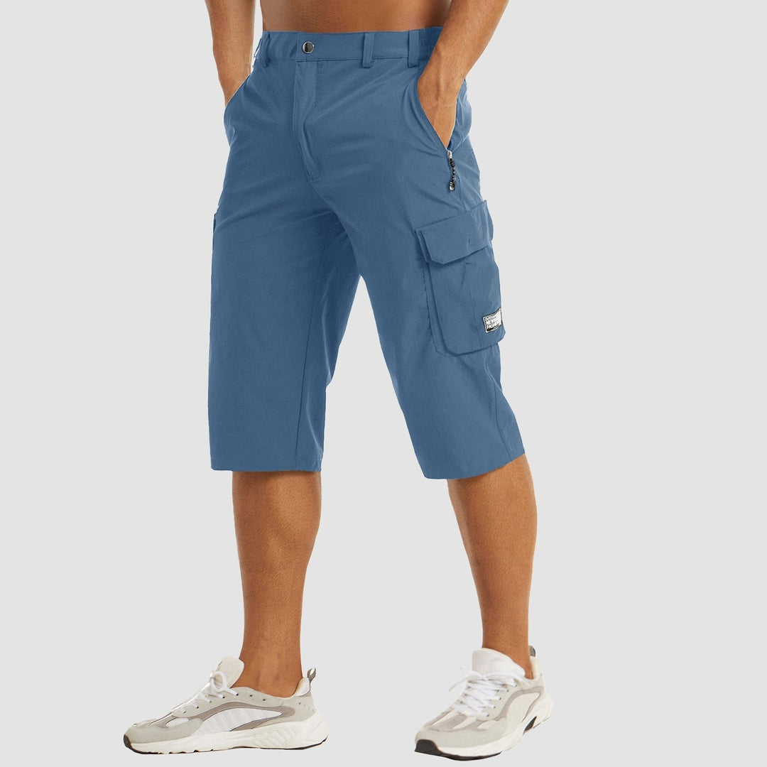 "Short cargo homme séchage rapide, multiples poches, design moderne et pratique, idéal aventure été."